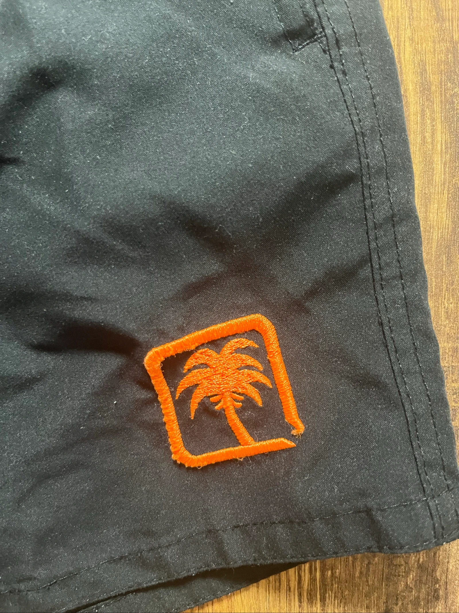 Solid black swim shorts with embroidered palm tree logo. Minimalist style - sun project - Size L - very good condition – photo 2